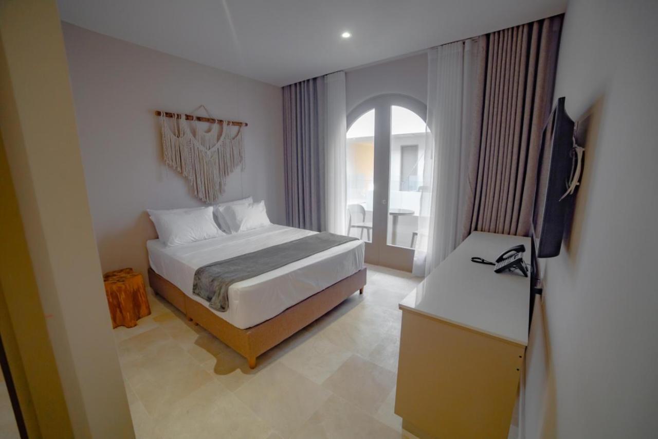 Loa Tolu By Bernalo Hotels Extérieur photo