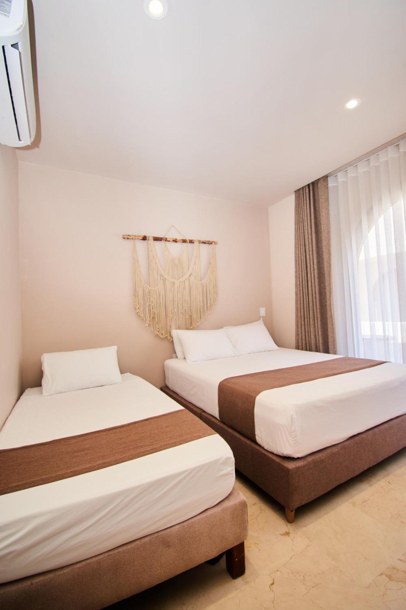 Loa Tolu By Bernalo Hotels Extérieur photo